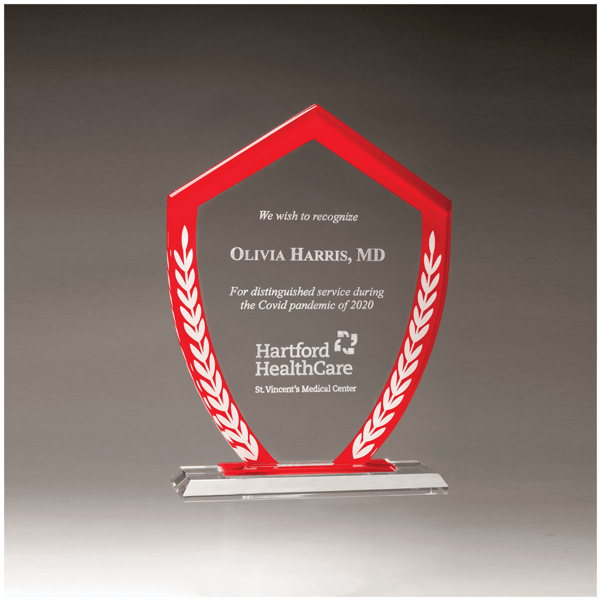 Shield Shaped Glass Award with Red Border and White Laurel Leaves